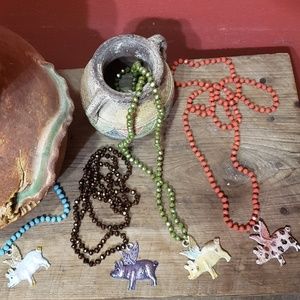 western collection and pigs can fly necklaces